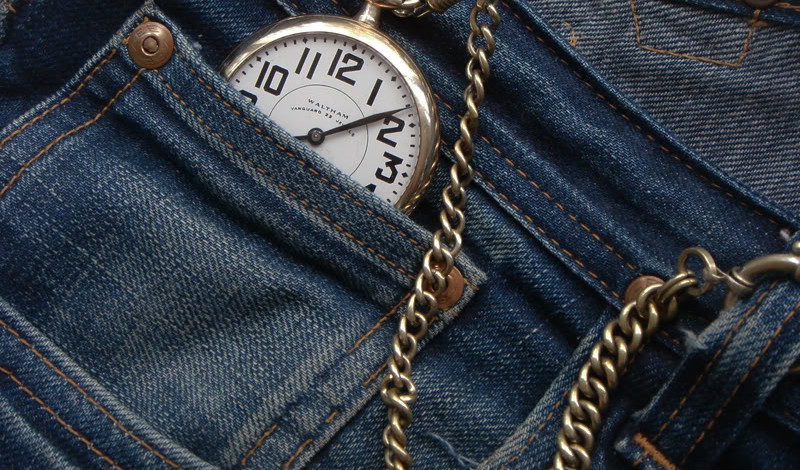 A cowboy's pocket watch in jeans